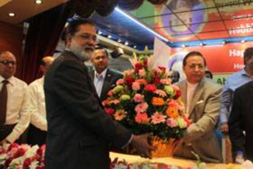 CEO Handed Over A Flower Basket to FBCCI President